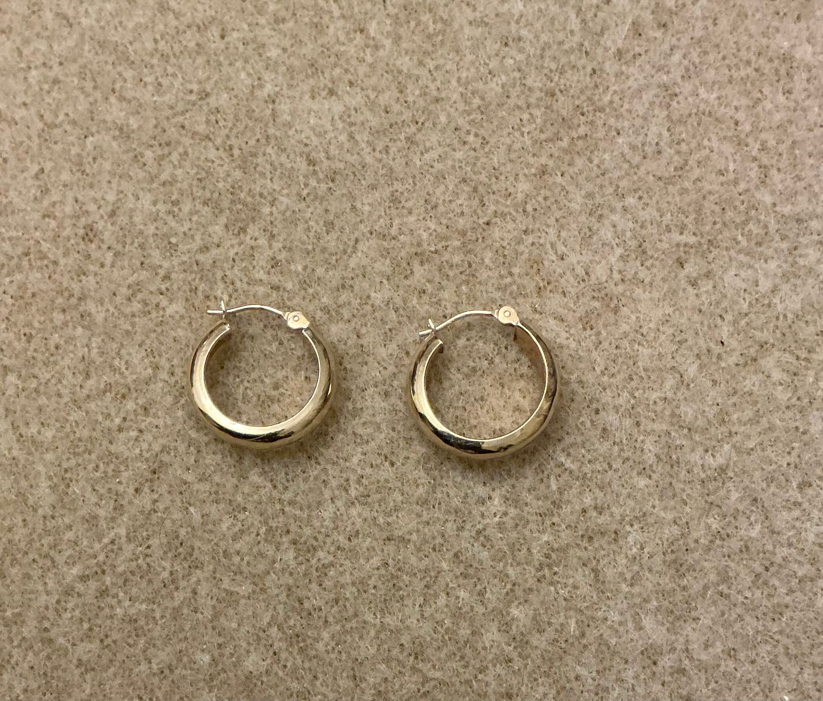 Marked 14K Yellow Gold Hoop Earrings: Approximately .75 inch
