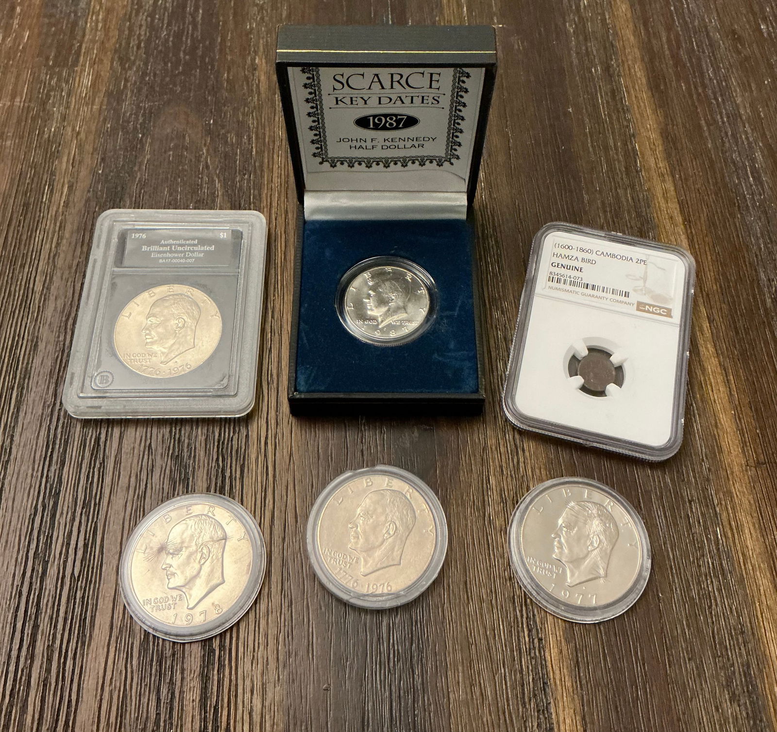 Genuine Cambodian Hamza Bird, Eisenhower Dollars, Kennedy Half Dollar: Unopened