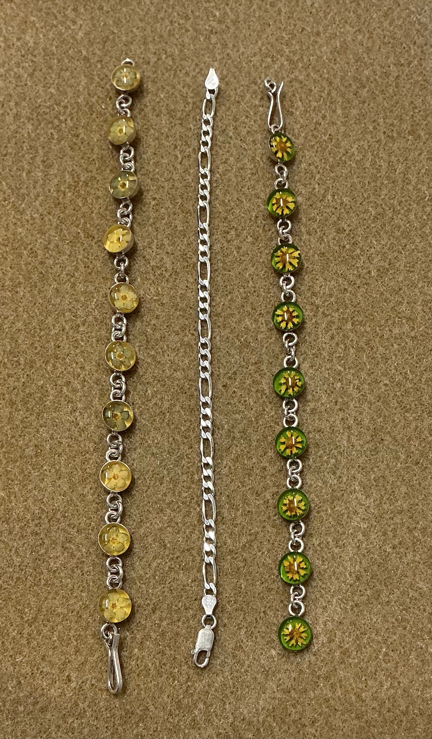 Silver Bracelet With Hallmark & Flower Bracelets Marked 925: 7-7.5” All marked 925, One with hallmark as shown