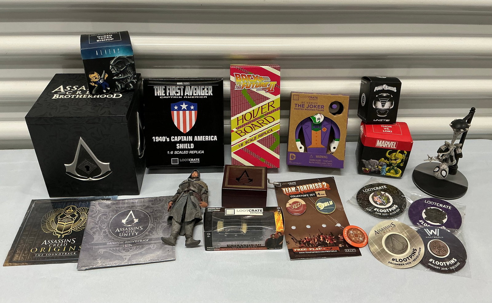 Loot Crate & Assassin’s Creed Collectibles: The Joker Aliens Power Rangers Marvel