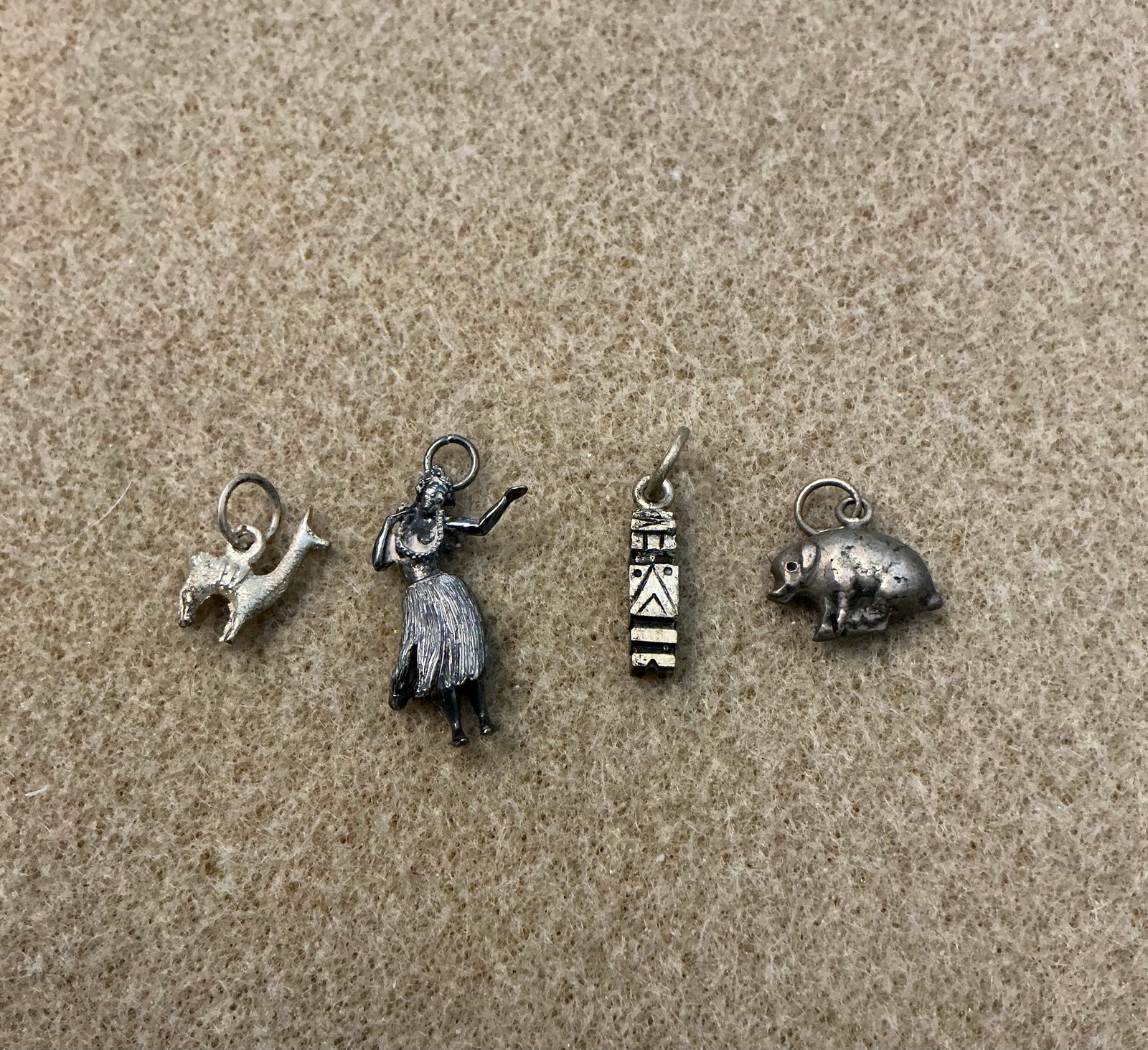 Articulated Hula Girl & Other Miniature Charms: Largest 1 in