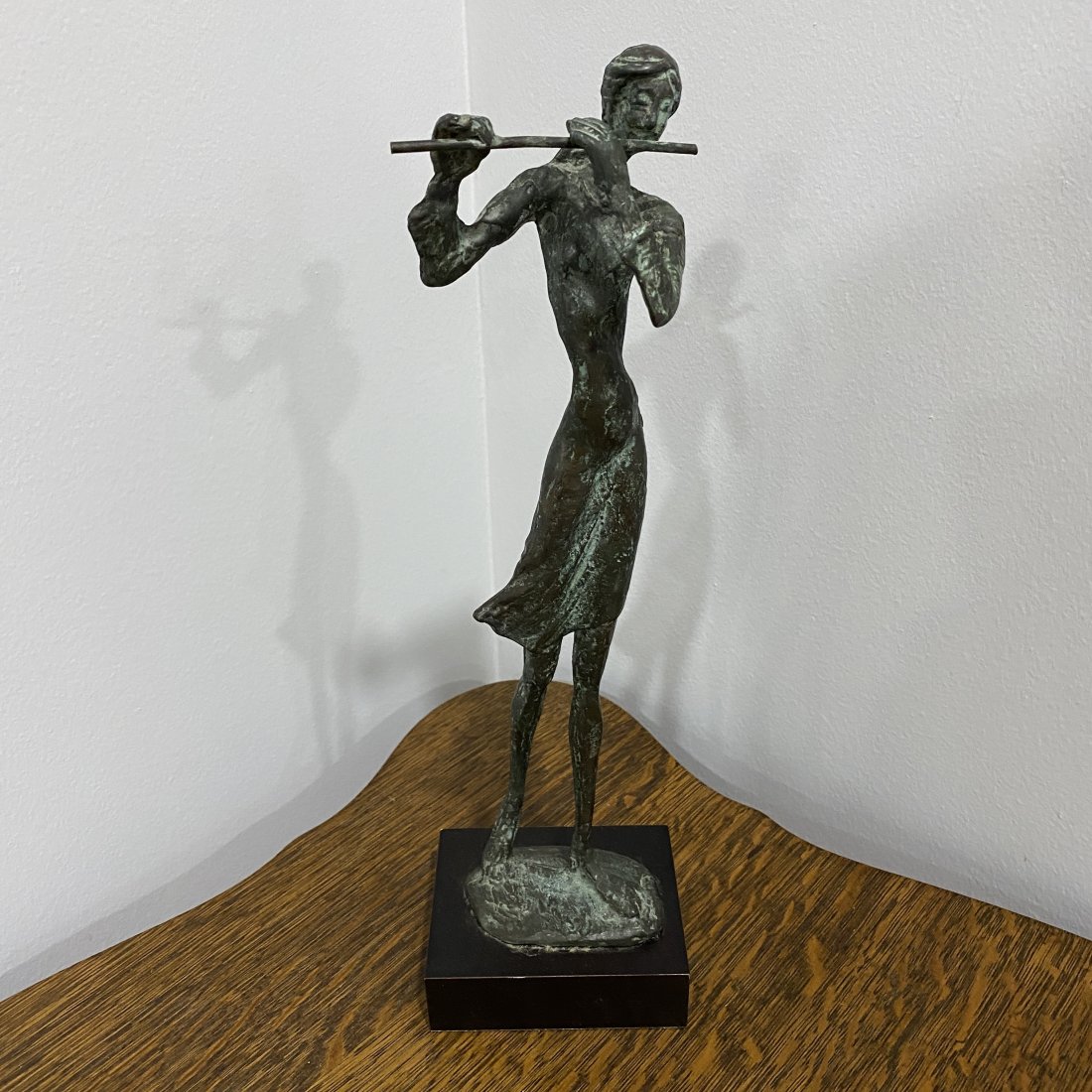 Bronze Statue Of A Person Playing A Flute Or Similar Instrument (1 of 5)