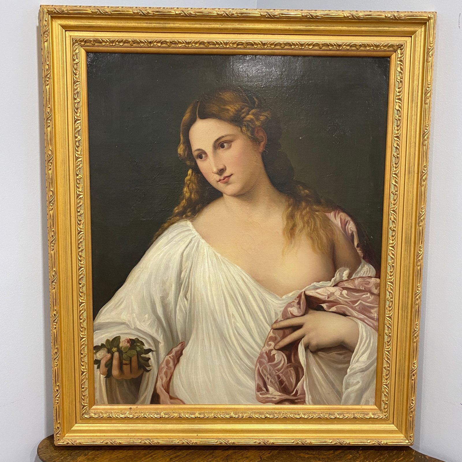 Titian Flora Goddess Of Spring Oil On Canvas Art Reproduction By A 18th Century Italian Artist: The picture size is 26” wide 32” tall. The original piece was by a 14th century artist. This one is a reproduction by a 18th century artist.