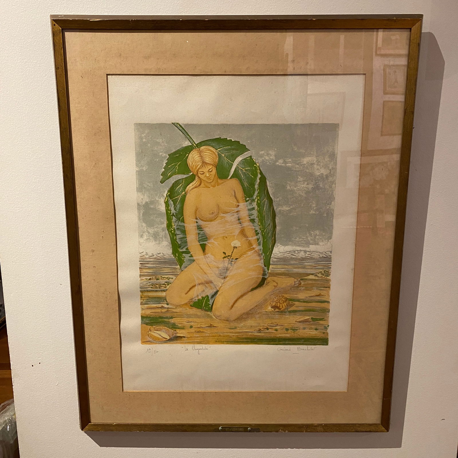 Gerald Bachelet Framed Art Woman With A Leaf At The Beach: The total size is 24” wide and 32” tall.