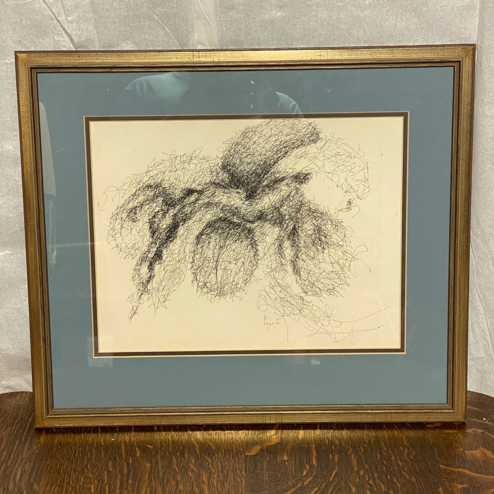 Woman Lying Down Etching Art: The frame size is 22” wide and 18” tall.