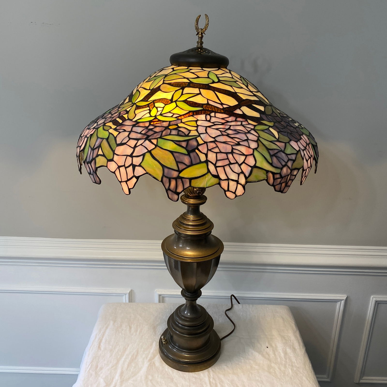 Tiffany Style Wisteria Stained Glass Lamp Stiffel Brass Trophy Base: The size is 21” diameter and 33” tall. (There are two of these pieces in this auction.)