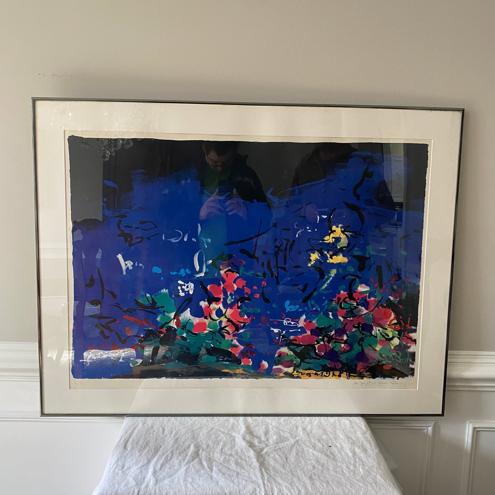 Lithograph Art Signed and Numbered 16 of 50: The size from the frame is 40” wide and 31” tall.