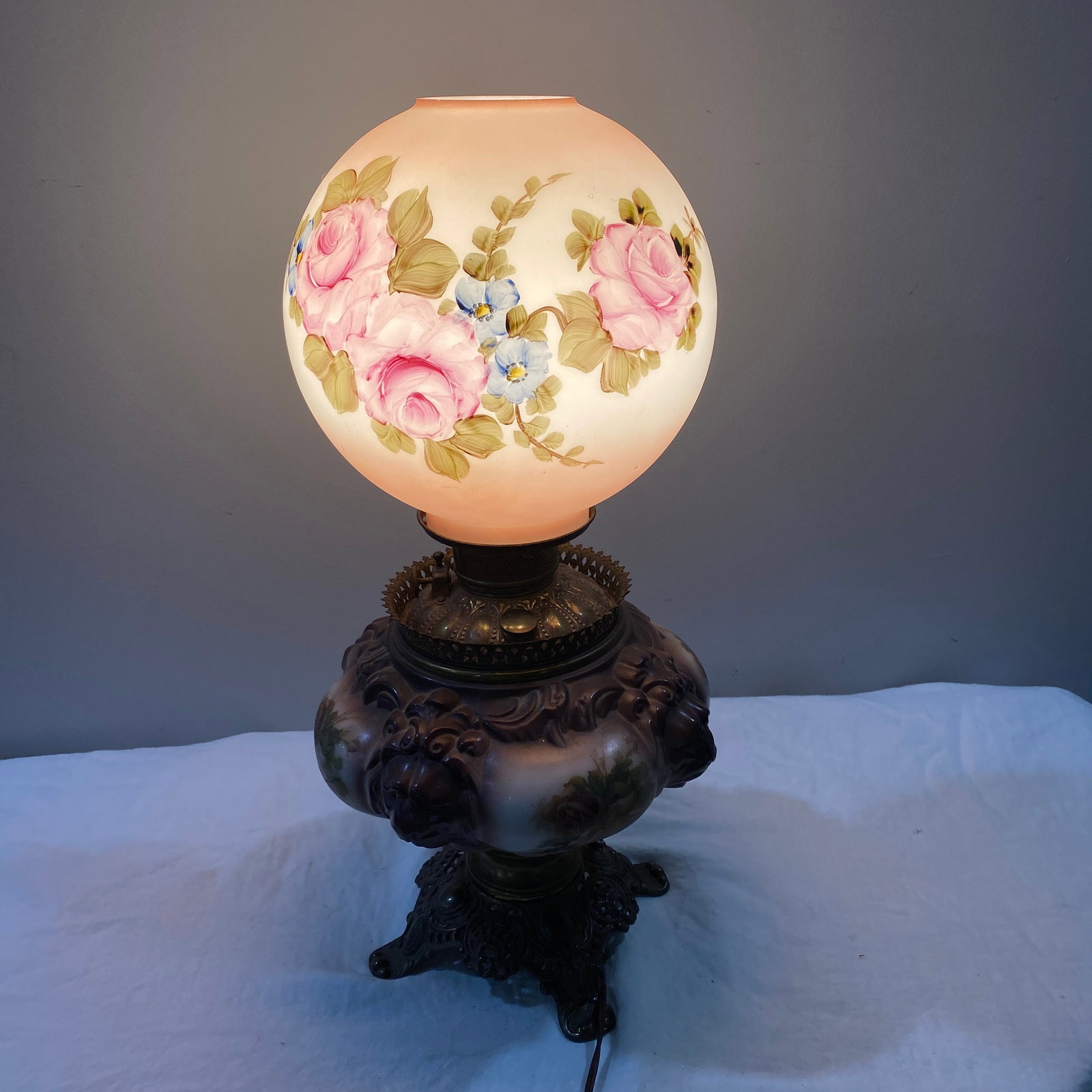Sphere Lamp With A Flower Design: The size is 11” diameter and 22” tall.