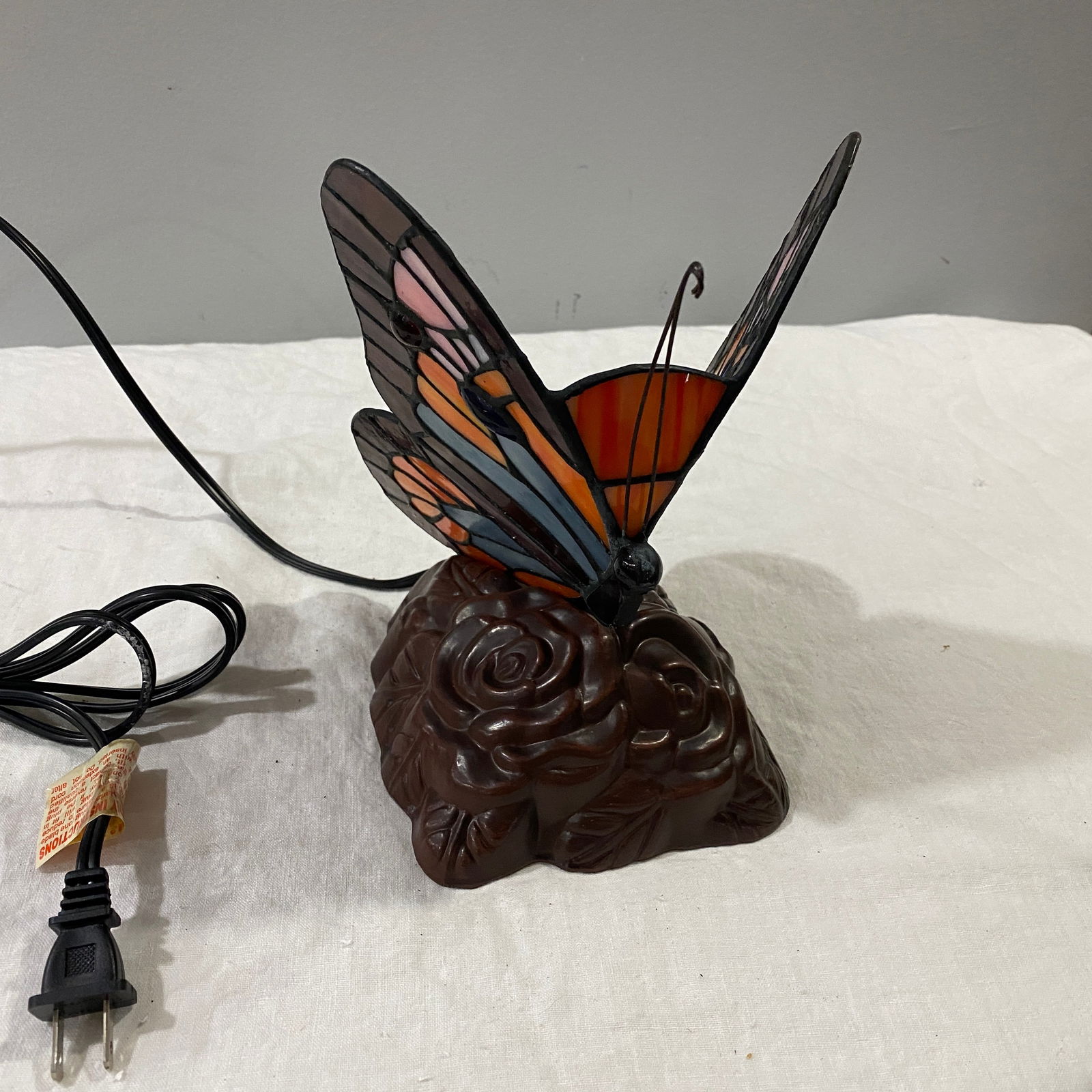 Butterfly Stained Glass Lamp: It is approximately 9”.
