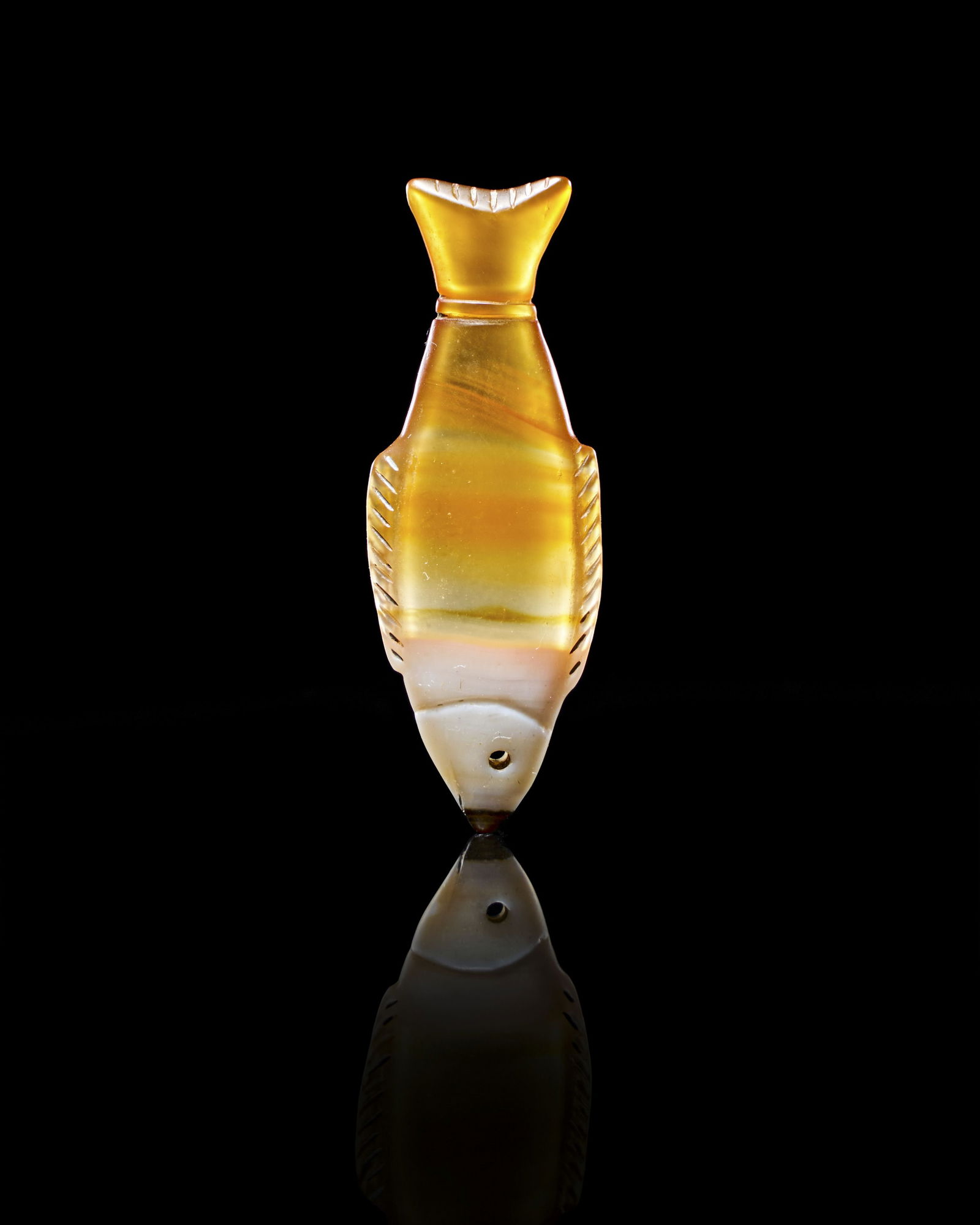 AN EGYPTIAN BANDED AGATE FISH AMULET, LATE PERIOD, CIRCA 664-332 B.C (1 of 4)