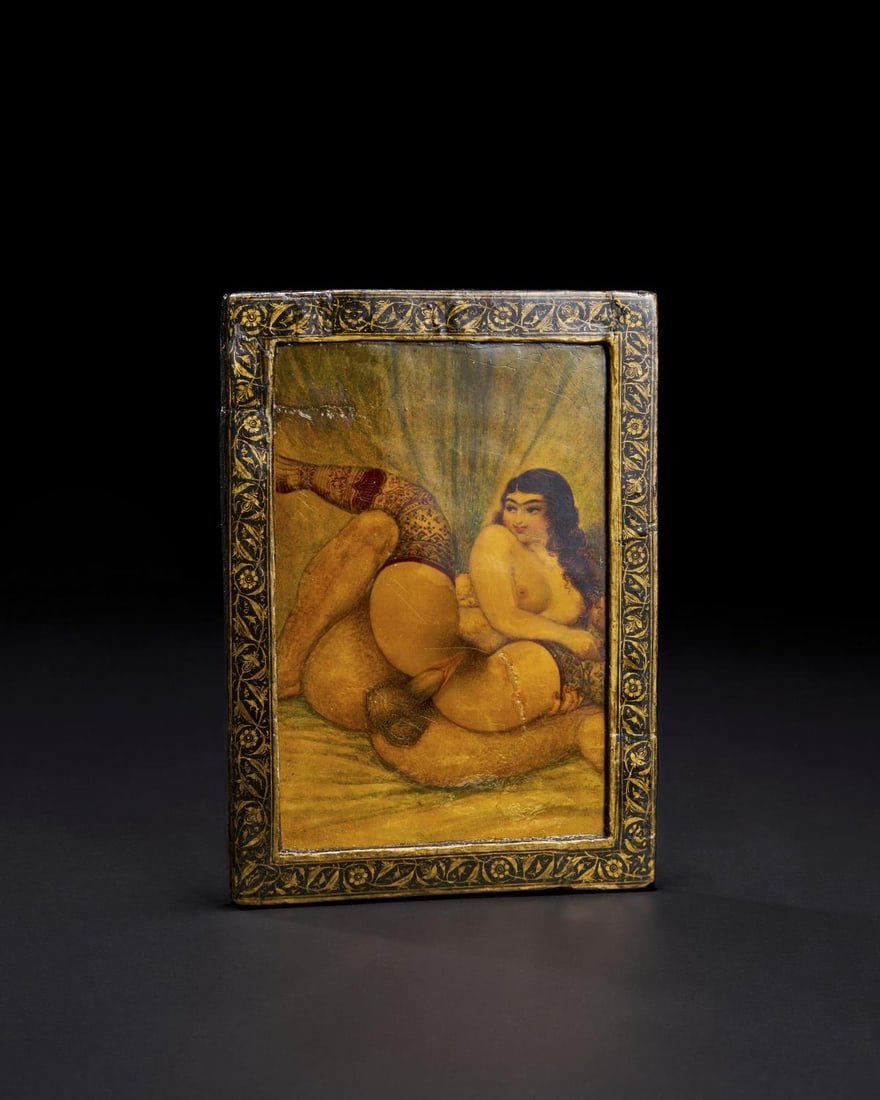 AN EROTIC QAJAR PAPER MACHE PANEL, 19TH CENTURY, PERSIA: AN EROTIC QAJAR PAPER MACHE PANEL, 19TH CENTURY, PERSIA Length x Width: 18.5 x 13.5cm