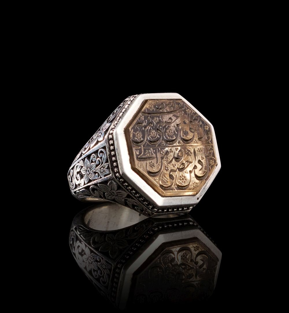 A CALLIGRAPHIC INSCRIBED DARK ROCK CRYSTAL RING ON SILVER, 19TH CENTURY, PERSIA (1 of 6)