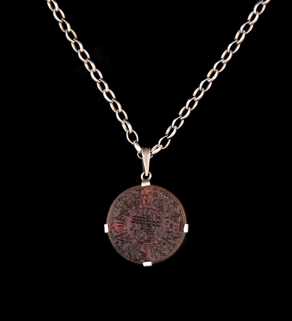 A RARE AGATE TALISMANIC AMULET, 19TH CENTURY, IRAN (1 of 3)