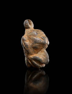 AN EGYPTIAN BRONZE BABOON AMULET PTOLEMAIC PERIOD, 304-30 B.C.: AN EGYPTIAN BRONZE BABOON AMULET, PTOLEMAIC PERIOD, 304–30 B.C
