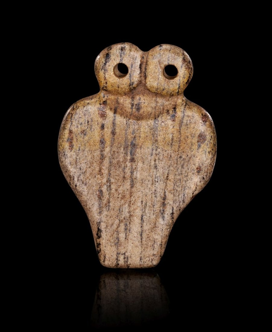 A STONE SPECTACLE IDOL TELL BRAK REGION CIRCA 4TH MILLENNIUM B.C.: A STONE SPECTACLE IDOL TELL BRAK REGION CIRCA 4TH MILLENNIUM B.C. A finely carved stone ‘spectacle idol’, its form