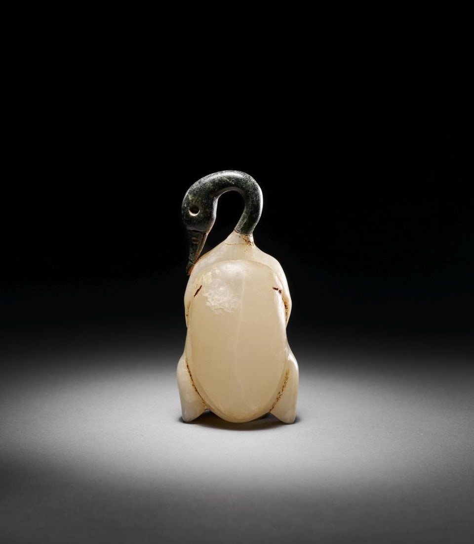 AN EGYPTIAN MARBLE & BRONZE COSMETIC VESSEL IN THE FORM OF A DUCK WEIGHT, NEW KINGDOM, 18TH DYNASTY, (1 of 3)