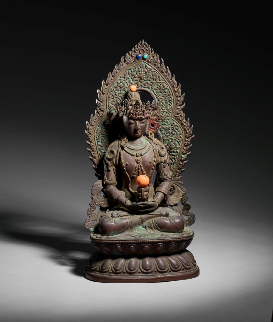 A BRONZE FIGURE OF A BUDDHA WITH CORAL PEARLS, QIANLONG PERIOD (1736-1795) (1 of 6)
