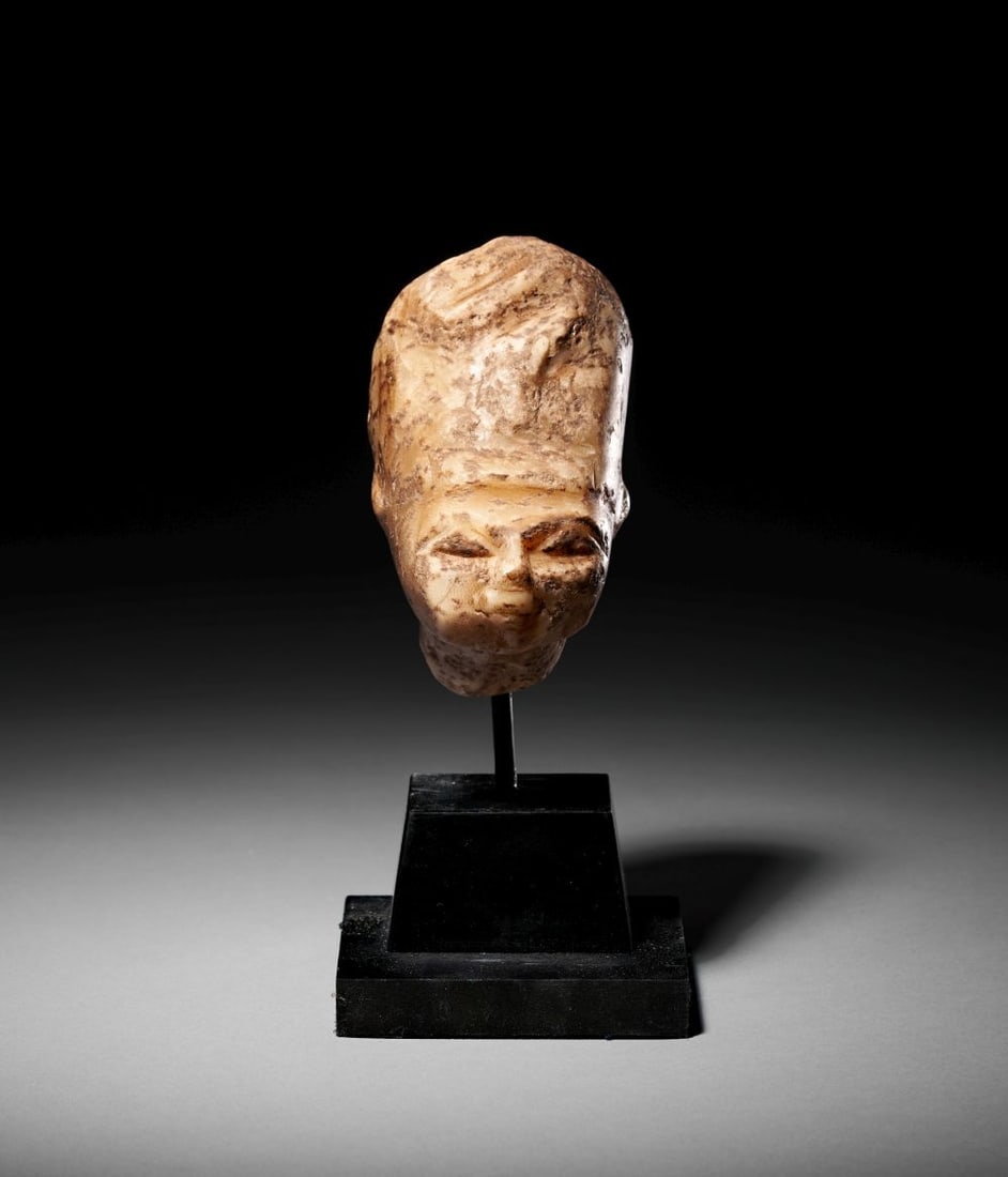 AN EGYPTIAN LIMESTONE HEAD OF A RULER, LATE PERIOD TO PTOLEMAIC PERIOD, CIRCA 4TH-3RD CENTURY B.C. (1 of 6)