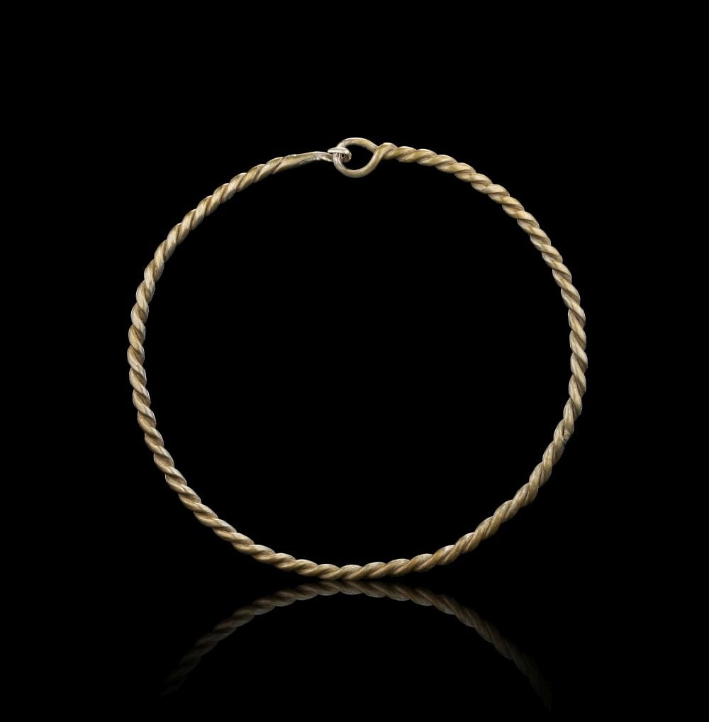 A VIKING AGE SILVER TWISTED BRACELET 9TH-11TH CENTURY A.D. OR EARLIER (1 of 1)