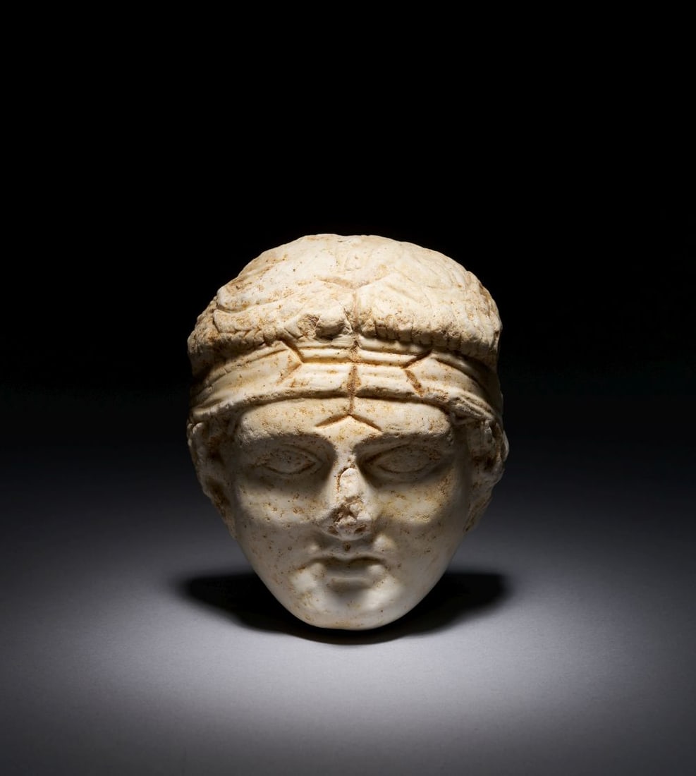A ROMAN MARBLE HEAD OF HONORIUS, 3RD-4TH CENTURY A.D. (1 of 4)