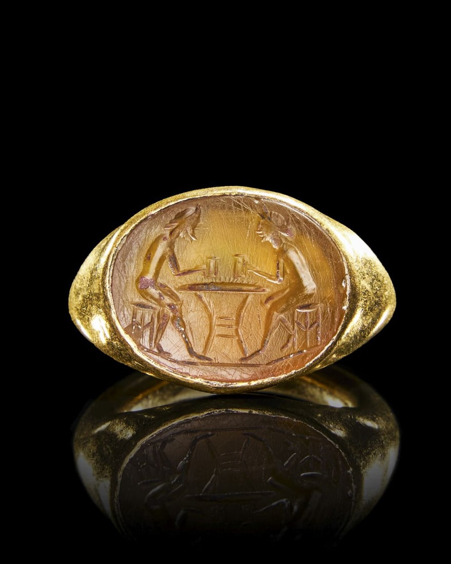 A ROMAN GOLD & CARNELIAN INTAGLIO RING, CIRCA 1ST CENTURY A.D. (1 of 3)