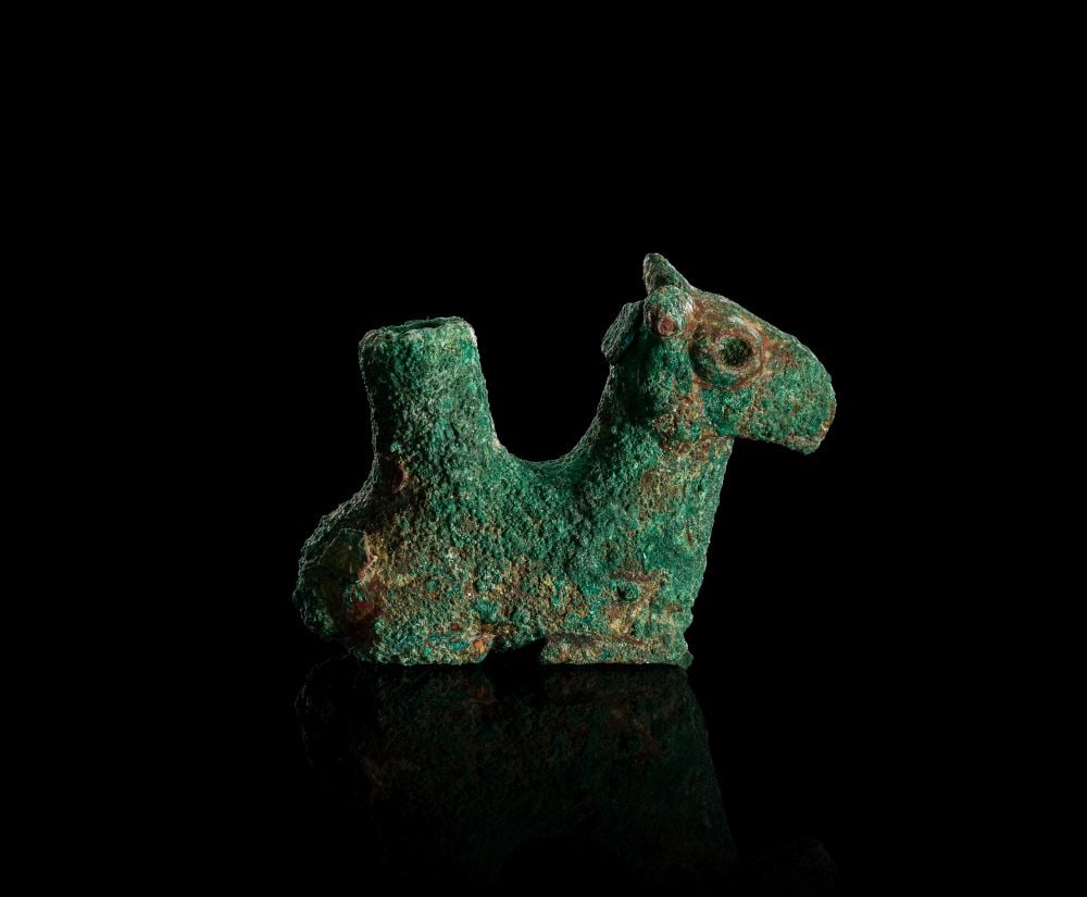 ELAMITE BRONZE VASE OF A RECUMBENT RAM, CIRCA 1000-600B.C. (1 of 4)