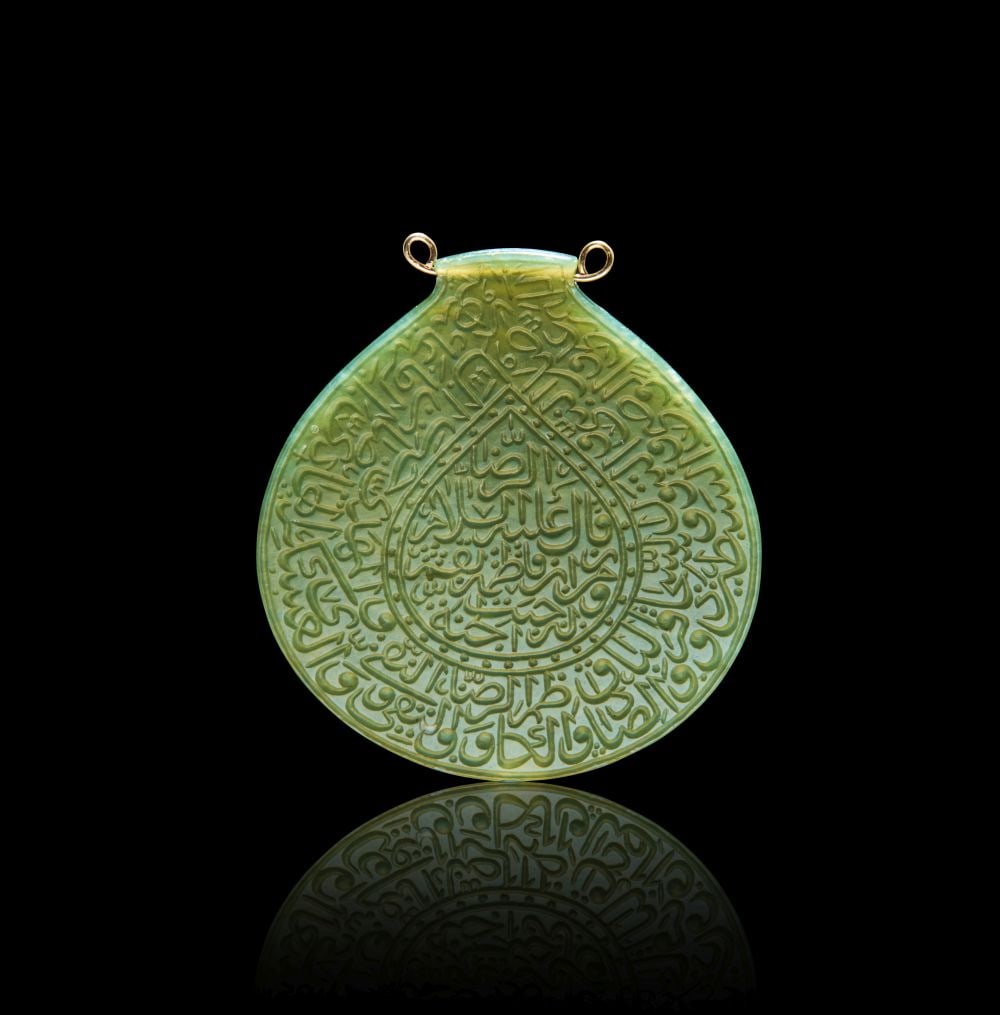 A CALLIGRAPHIC INSCRIBED JADE AMULET, 19TH CENTURY, PERSIA