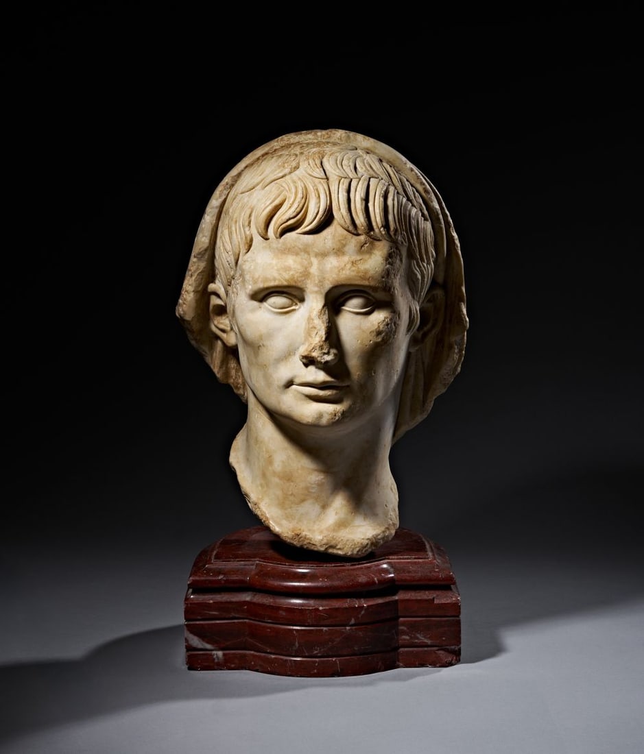 A MONUMENTAL ROMAN MARBLE PORTRAIT HEAD OF THE EMPEROR AUGUSTUS, JULIO-CLAUDIAN PERIOD, CIRCA EARLY (1 of 8)