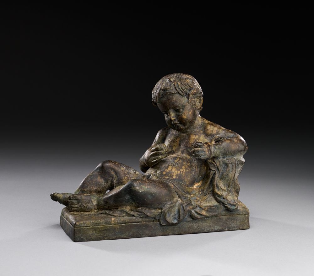 A GREEK BRONZE FIGURE OF EROS HELLENISTIC PERIOD, CIRCA 2ND-1ST CENTURY B.C.: A GREEK BRONZE FIGURE OF EROS HELLENISTIC PERIOD, CIRCA 2ND-1ST CENTURY B.C. A charming bronze figur