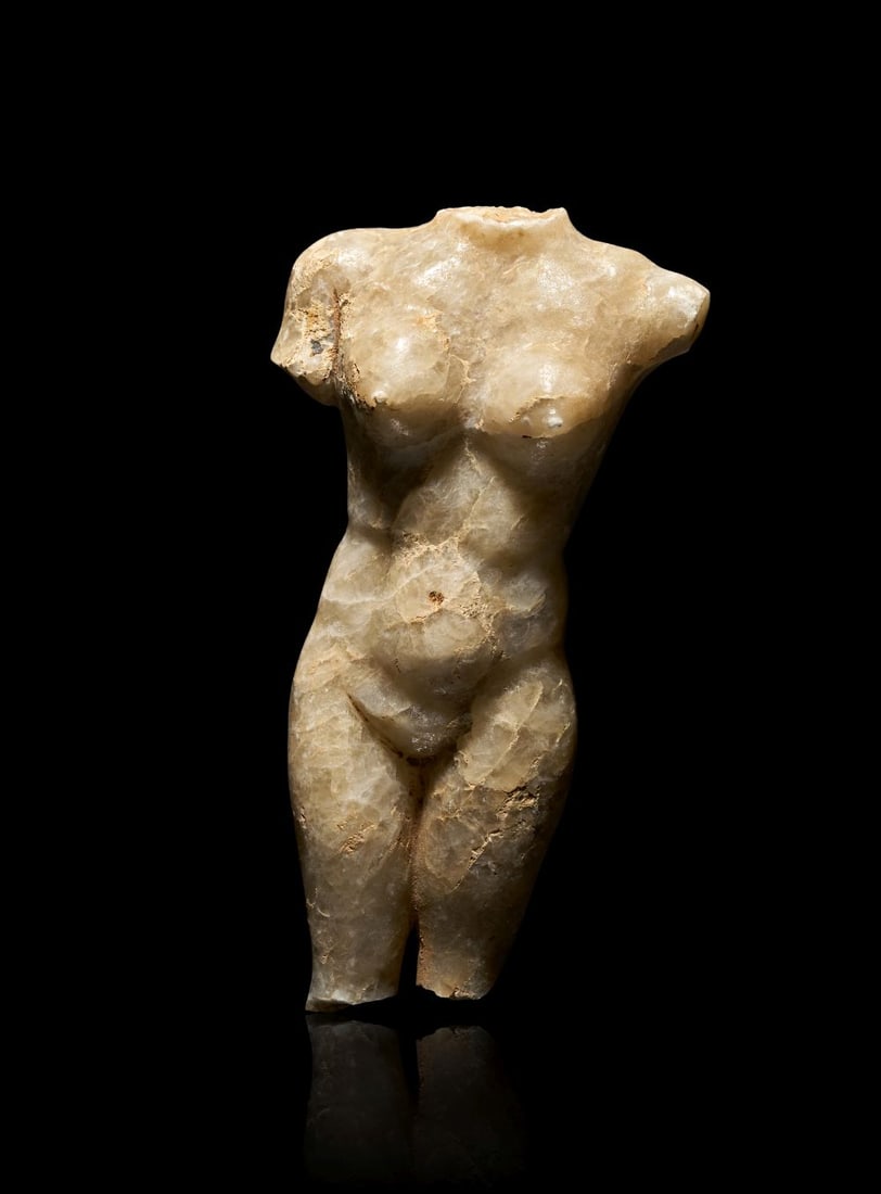 A GREEK MARBLE TORSO OF A MAIDEN HELLENISTIC PERIOD, CIRCA 1ST CENTURY B.C. (1 of 4)