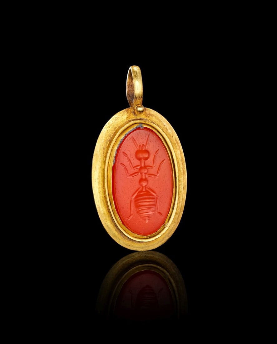 A ROMAN CARNELIAN INTAGLIO AMULET, CIRCA 2ND-3RD CENTURY A.D. (1 of 3)