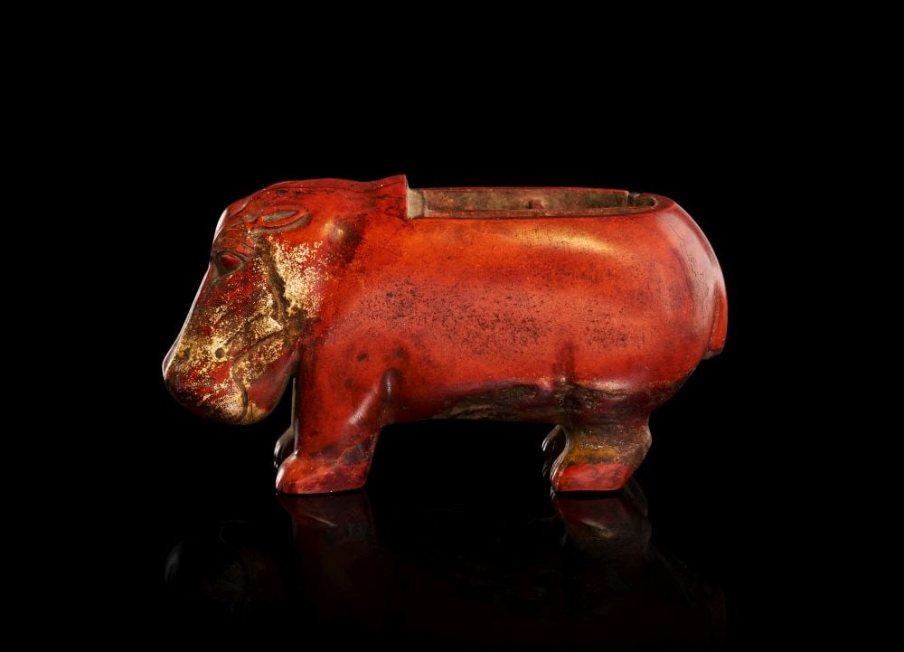 AN EGYPTIAN RED JASPER HIPPOPOTAMUS PREDYNASTIC PERIOD, CIRCA 3000 B.C. (1 of 5)