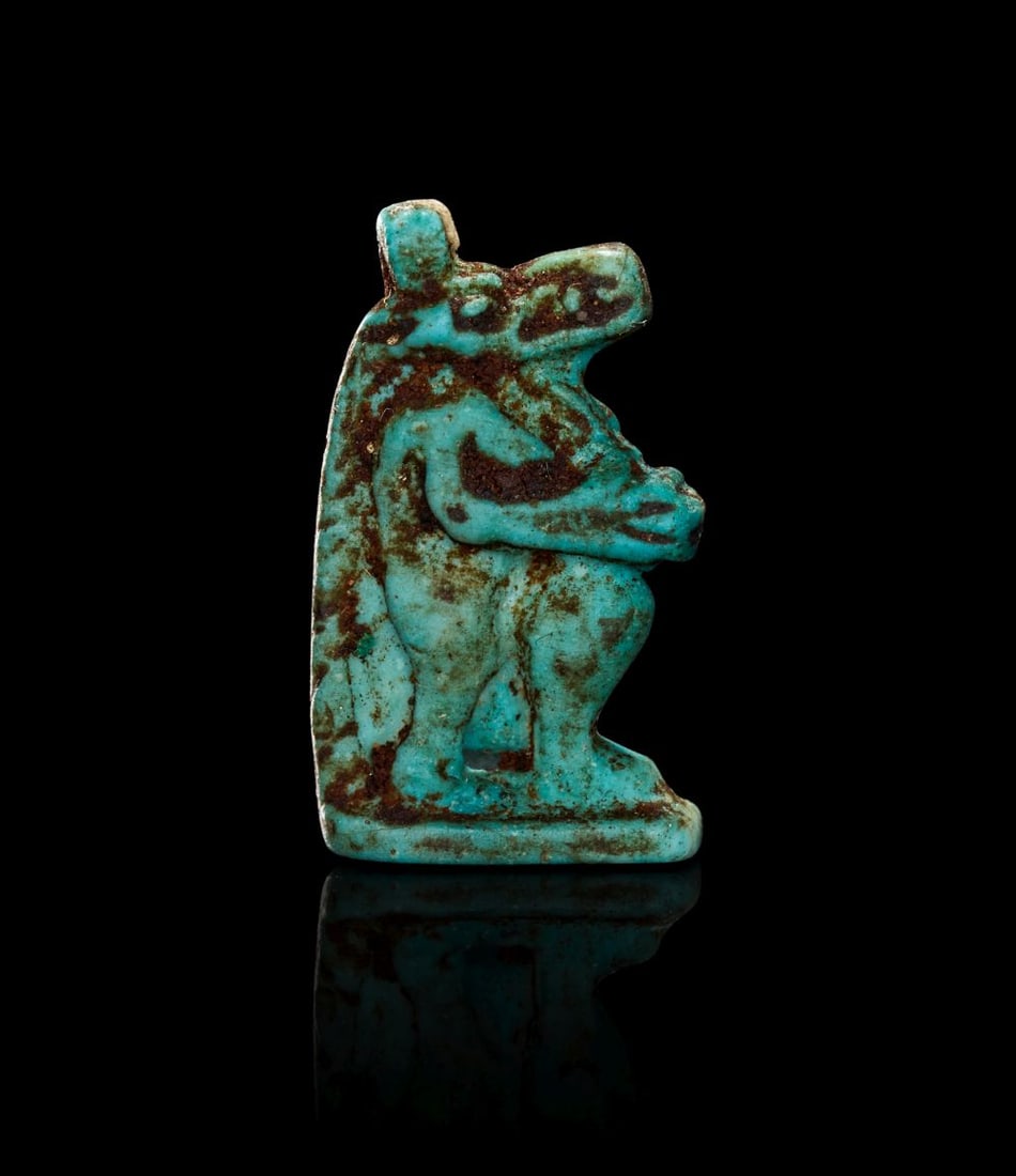 A LATE PERIOD FAIENCE AMULET OF TAWERET DYNASTY XXVI-XXX, 664-343 B.C. (1 of 2)