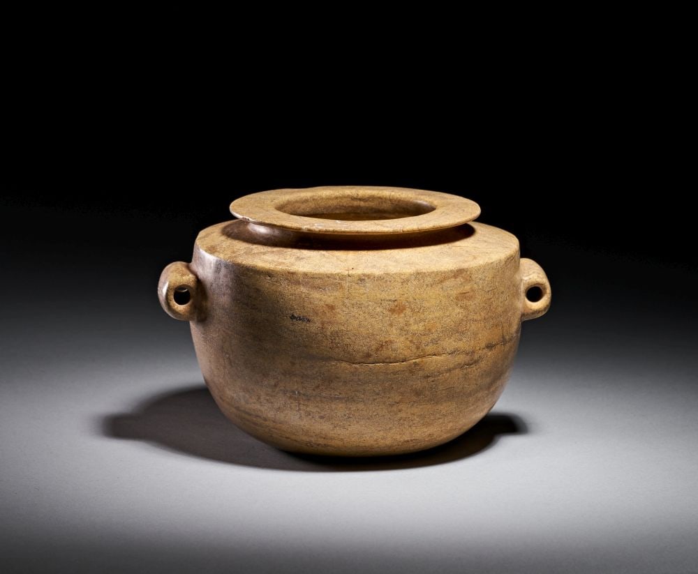 AN EGYPTIAN PREDYNASTIC SCHIST OR LIMESTONE, JAR CIRCA 3100 B.C. (1 of 5)