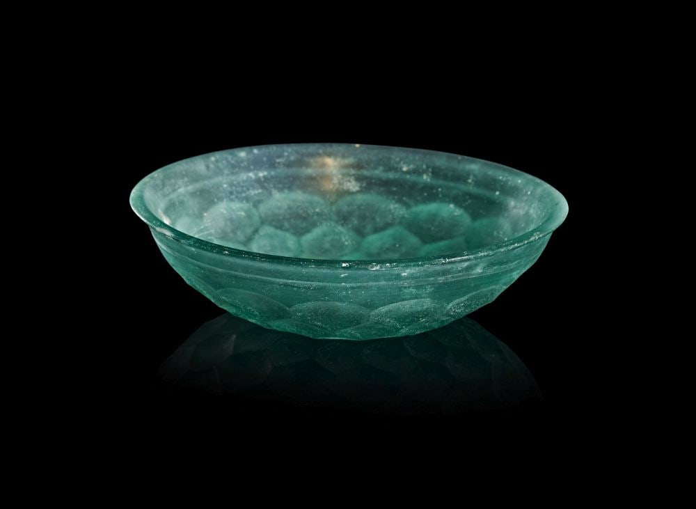 A SASANIAN FACET-CUT GLASS DISH CIRCA 4TH-6TH CENTURY A.D. (1 of 2)