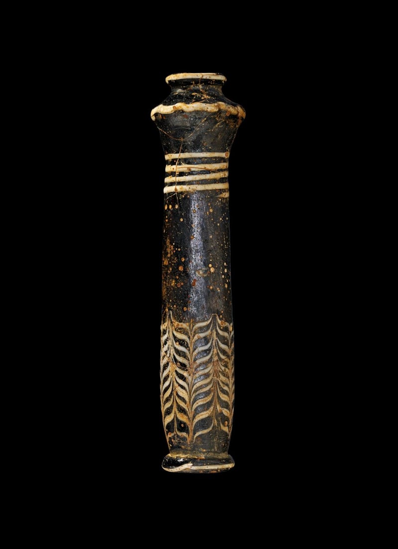 AN EGYPTIAN CORE-FORMED GLASS KOHL VESSEL NEW KINGDOM, 18TH DYNASTY, CIRCA 15TH-14TH CENTURY B.C. (1 of 2)