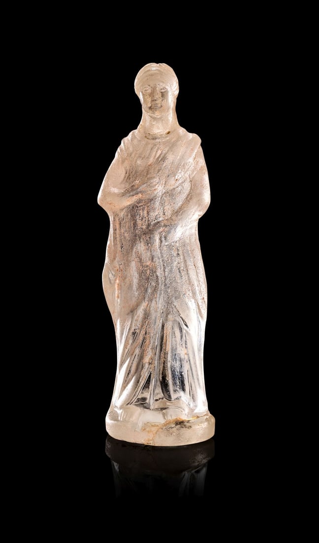 A GREEK CRYSTAL FIGURINE OF A MAIDEN, CIRCA 3RD CENTURY B.C. (1 of 4)