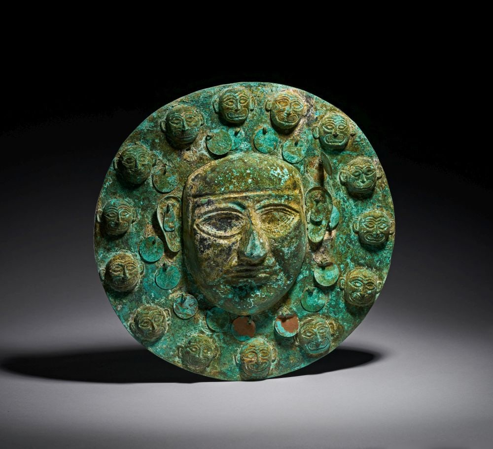 A LARGE MOCHE COPPER DISC, CIRCA 6TH-7TH CENTURY, PERU (1 of 10)