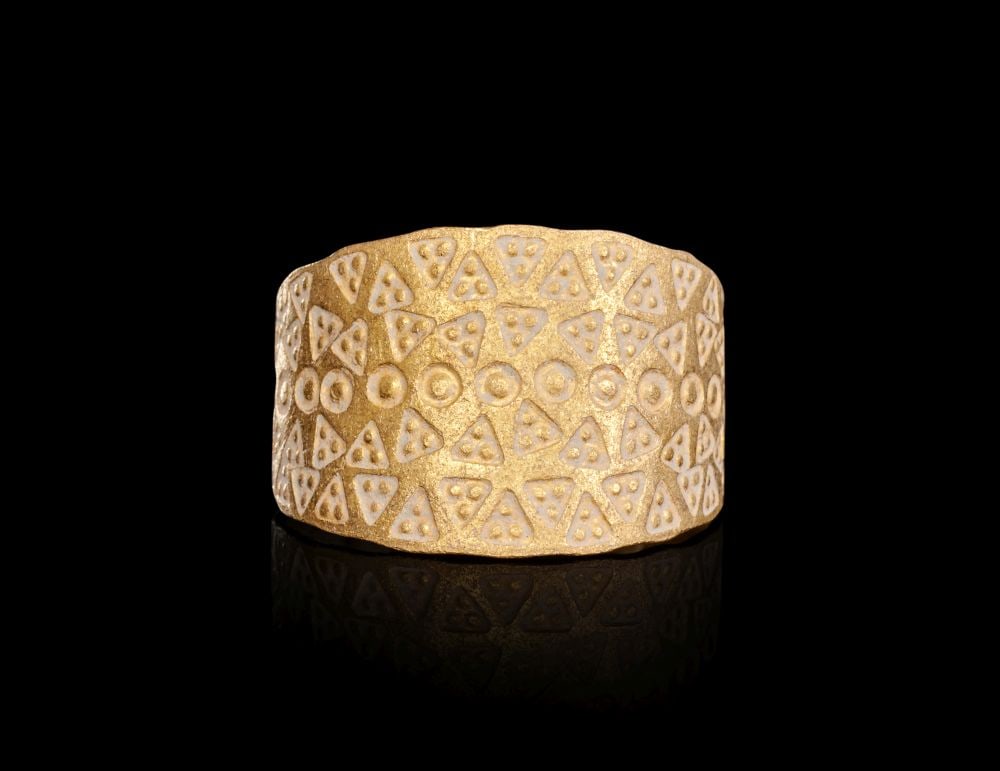 A VIKING GOLD RING, CIRCA 9TH-10TH CENTURY A.D.: A VIKING GOLD RING, CIRCA 9TH–10TH CENTURY A.D. Formed from a substantial hoop of high-karat gold, this Viking-period ring presents a bold yet restrained silhouette, its broad band subtly tape