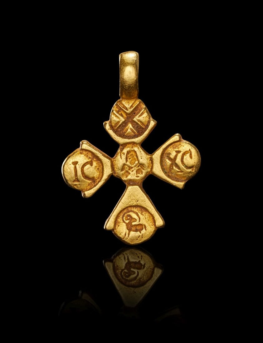 A BYZANTINE GOLD CROSS WITH INSCRIPTION & RAM, CIRCA 7TH CENTURY A.D. (1 of 2)