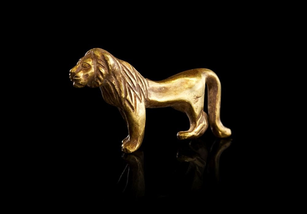 A ROMAN SOLID GOLD FIGURINE IN THE FORM OF A LION, CIRCA 1ST-2ND CENTURY A.D. (1 of 3)