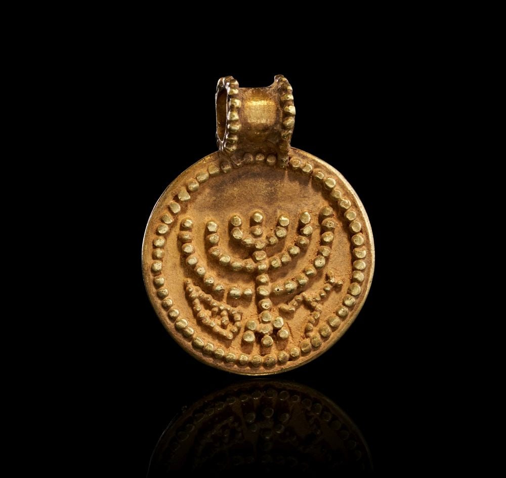 A ROMAN GOLD MENORAH AMULET, CIRCA 1ST-2ND CENTURY A.D. (1 of 2)