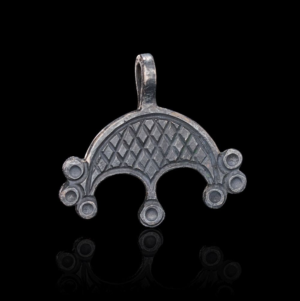 A VIKING SILVER AMULET, CIRCA 9TH-10TH CENTURY A.D. (1 of 2)
