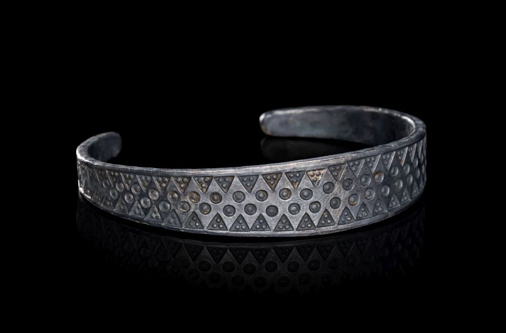 A VIKING SILVER BRACELET, CIRCA 9TH-10TH CENTURY A.D. (1 of 3)