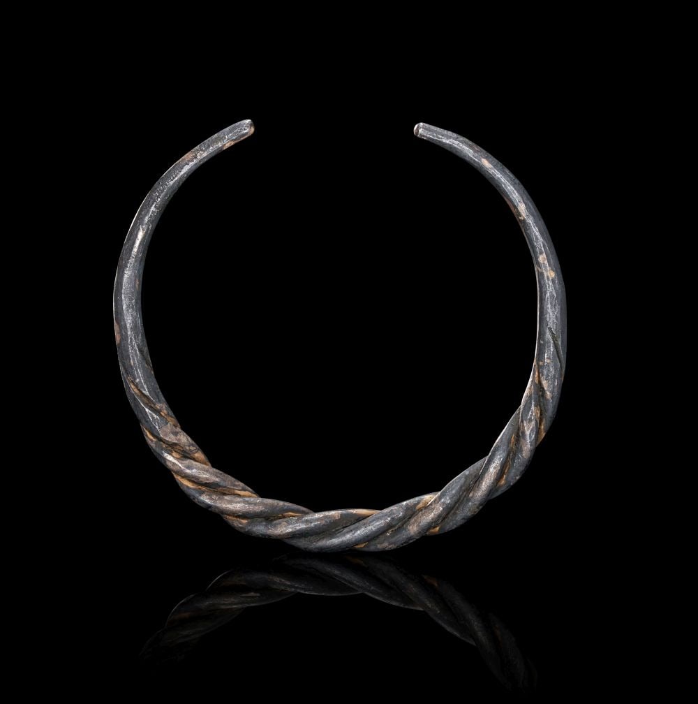 A VIKING SILVER BRACELET, CIRCA 9TH-10TH CENTURY A.D. (1 of 2)