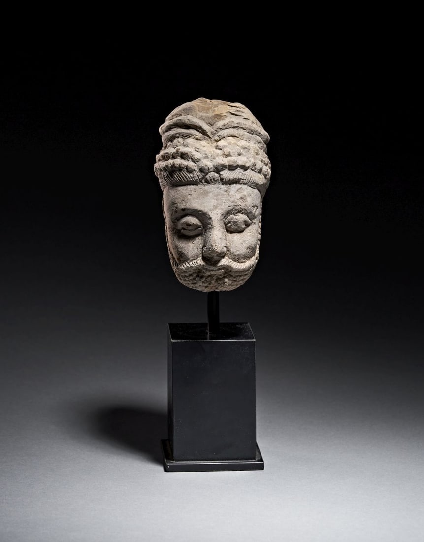 A GANDHARA GREY SCHIST HEAD OF A BODHISATTVA, CIRCA 4TH CENTURY (1 of 4)