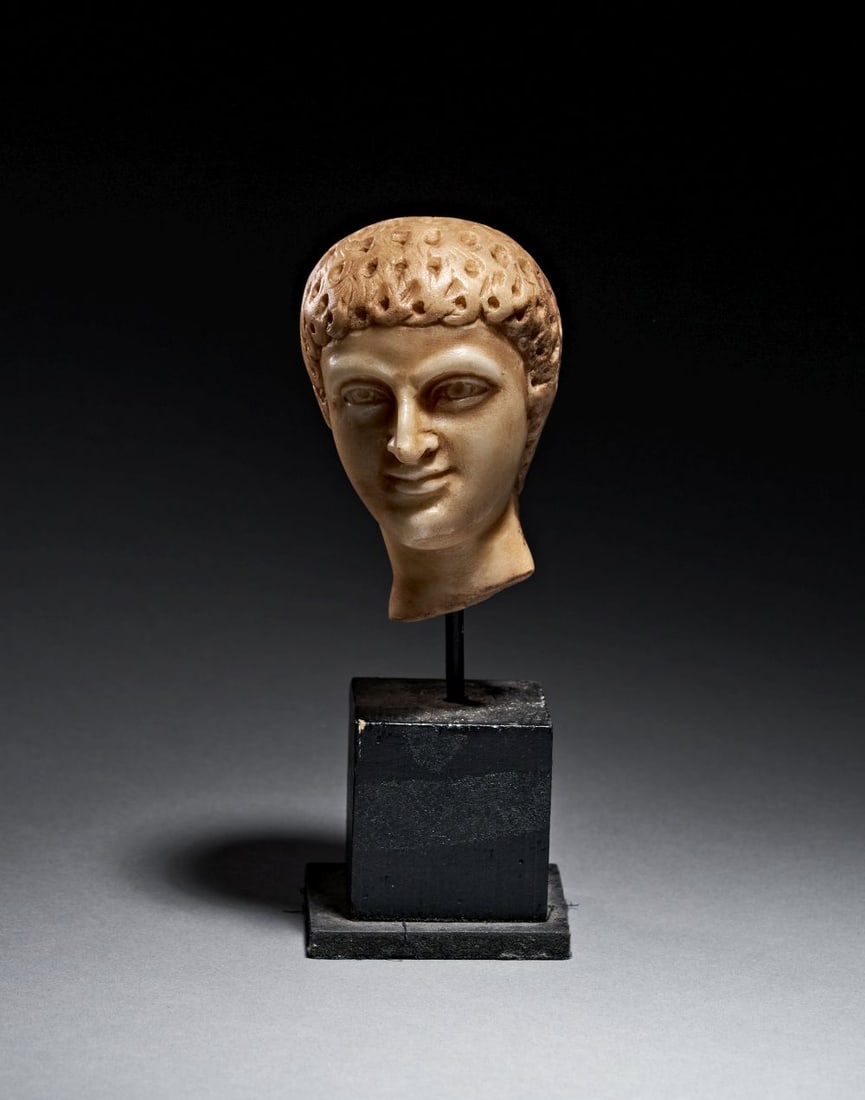 A LATE GREK MARBLE HEAD OF A MAN, CIRCA 3RD-4TH CENTURY A.D. OR LATER (1 of 4)