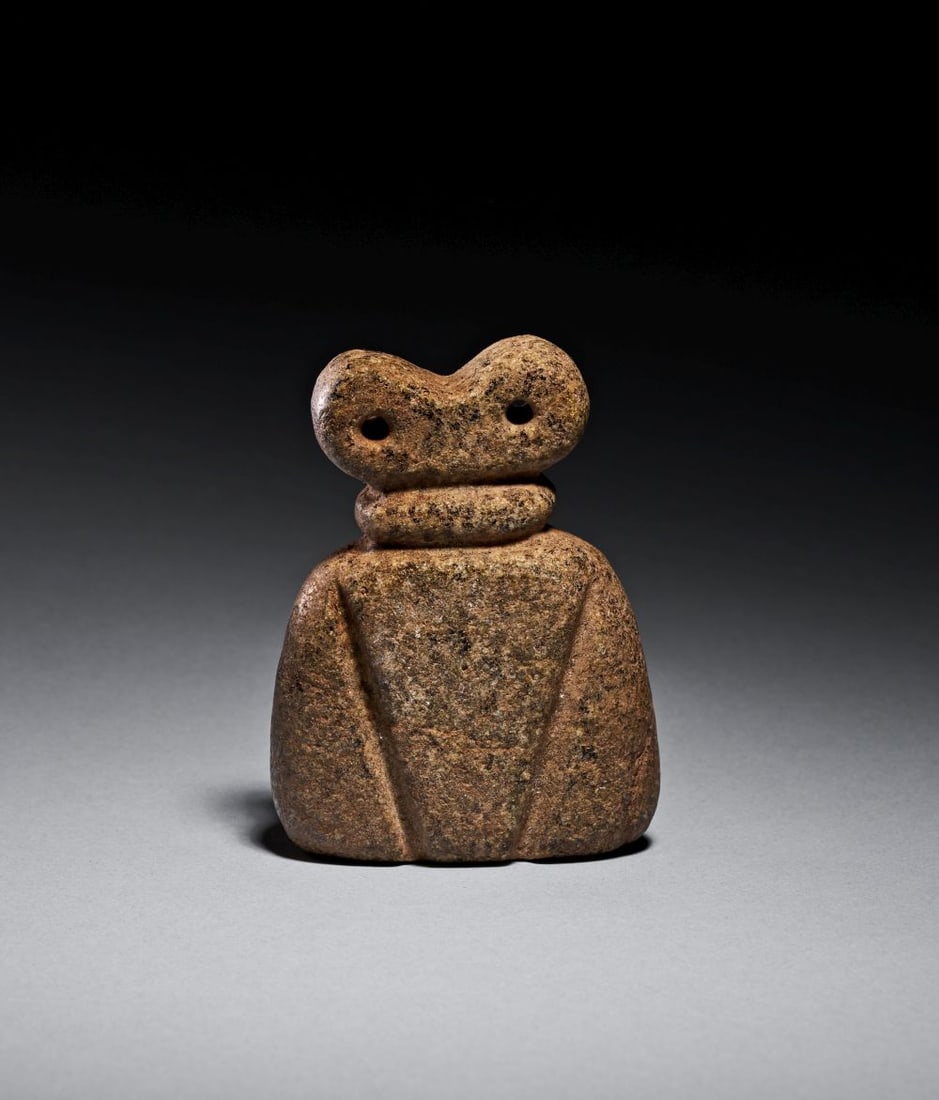 A MESOPOTAMIAN STONE SPECTACLE IDOL, CIRCA 3000 B.C. (1 of 4)