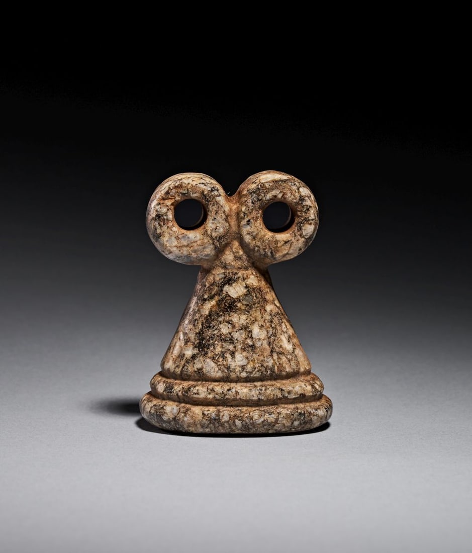 A MESOPOTAMIAN STONE SPECTACLE IDOL, CIRCA 3000 B.C. (1 of 4)