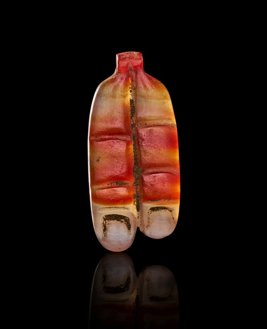 TWO EGYPTIAN AGATE FINGERS AMULET NEW KINGDOM, DYNASTY XIX, CIRCA 1279-1212 B.C. (1 of 2)